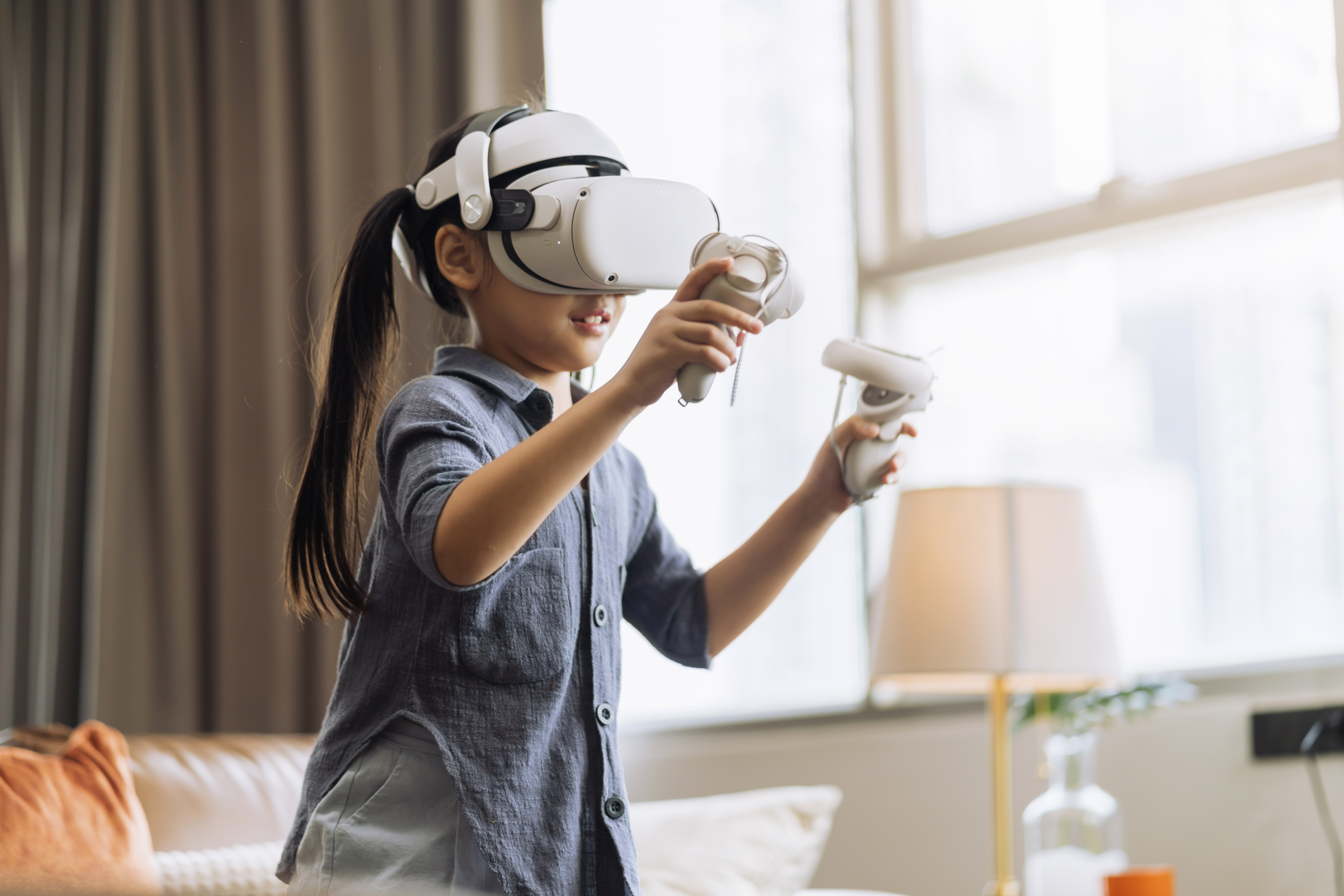 girl wearing virtual reality glasses